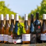 Bizoe Wines on a barrel in the vineyard